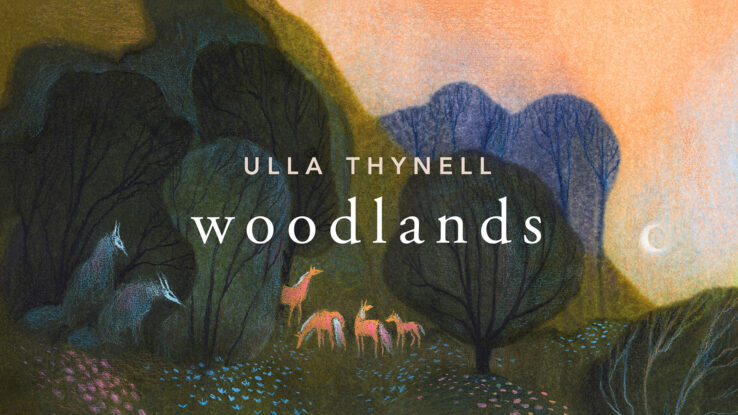 Text: Expanded Edition, Art Book, woodlands, Ulla Thynell. Illustration: A blend of dark trees, a sky in shades of lavender, blue, peach, and orange, with the ethereal figures of three bears magically emanating from the tree tops, as a small figure at their base in a pointed hat and staff, gazes upward to the forest and a crescent moon.